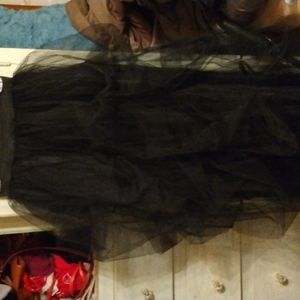 Long black skirt with netting over the top